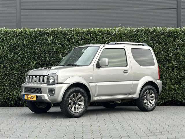 Suzuki Jimny 1.3 EXCLUSIVE, AIRCO, NAVI, LEDER, TREKHAAK, DAKRAILS, ELEKTRISCHE RAMEN, LICHTMETAAL 15"