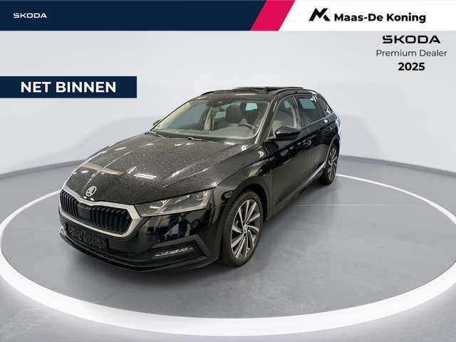 Skoda Octavia skoda  combi 1.4 tsi 204pk dsg iv phev business edition · panoramadak · camera · keyless · parkeer assistent · stuur- & stoelverwarming · apple/android car play · sfeerverlichting · foto 1