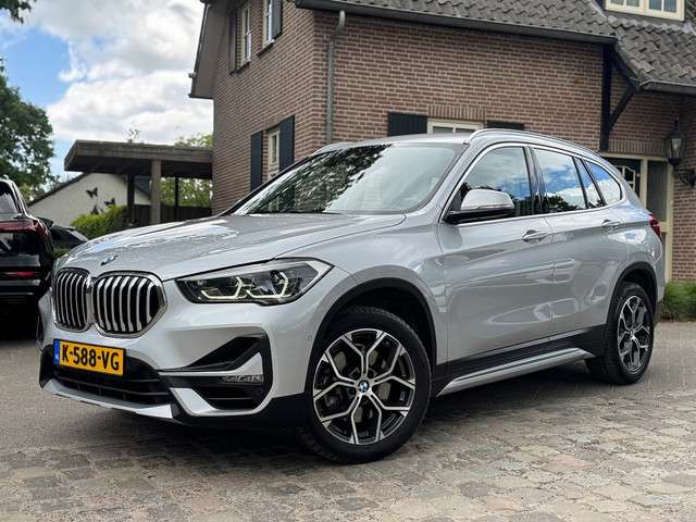 Bmw X1 sdrive 2.0i 178pk high executive ecc,lmv,led,navigatie,trekhaak,leer,sportstoel foto 20