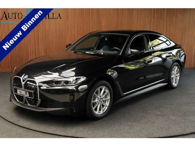 BMW i4 eDrive40 84 kWh M-pakket Navi Leer Elektr. achterklep 360° Camera Co-pilot Climate voor & achter Zwarte hemelbekleding PDC LM velgen BTW auto